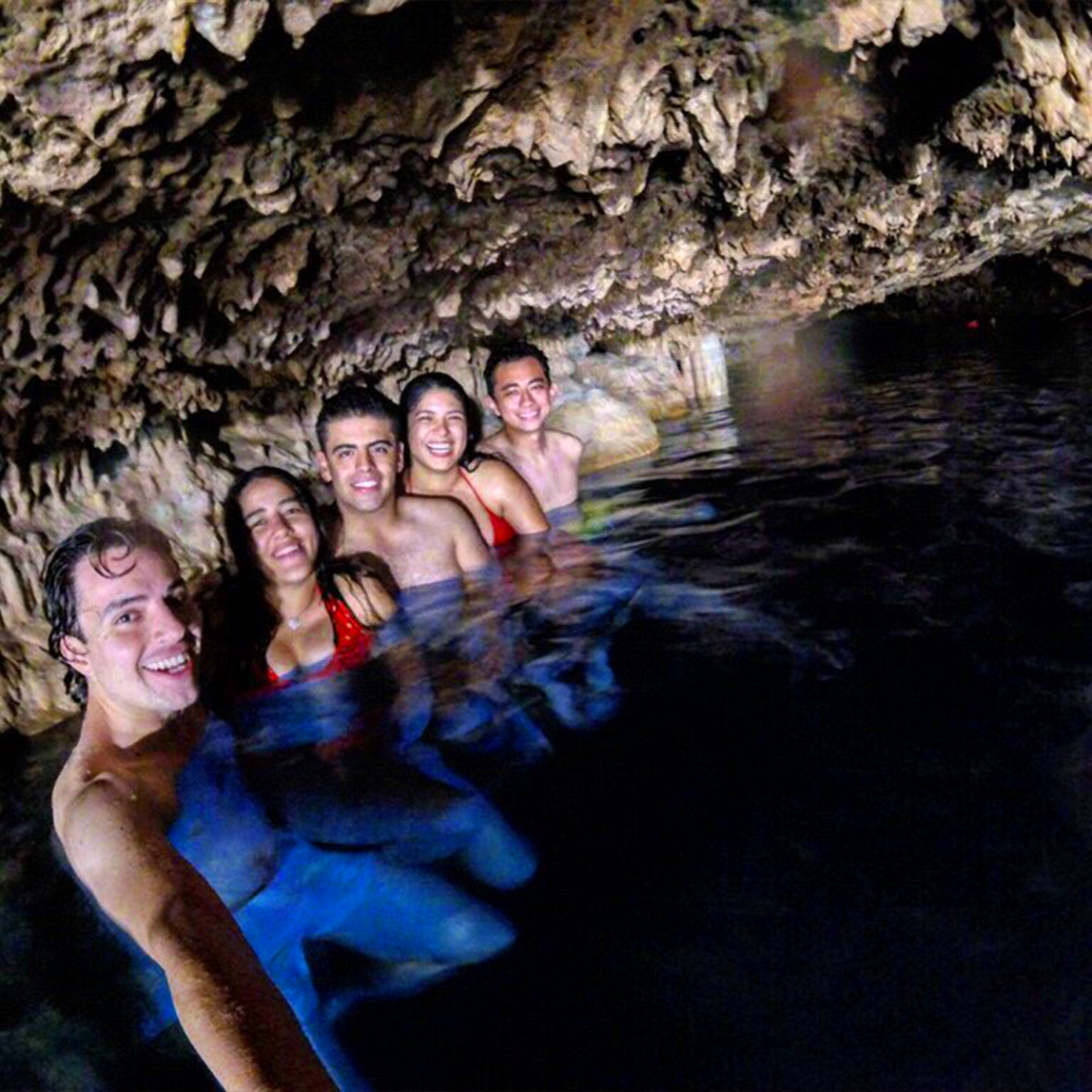 Family Inside The Cenote